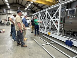 Greer CPW employees at Kusters Water in Spartanburg discussing the upcoming wastewater treatment plant expansion.